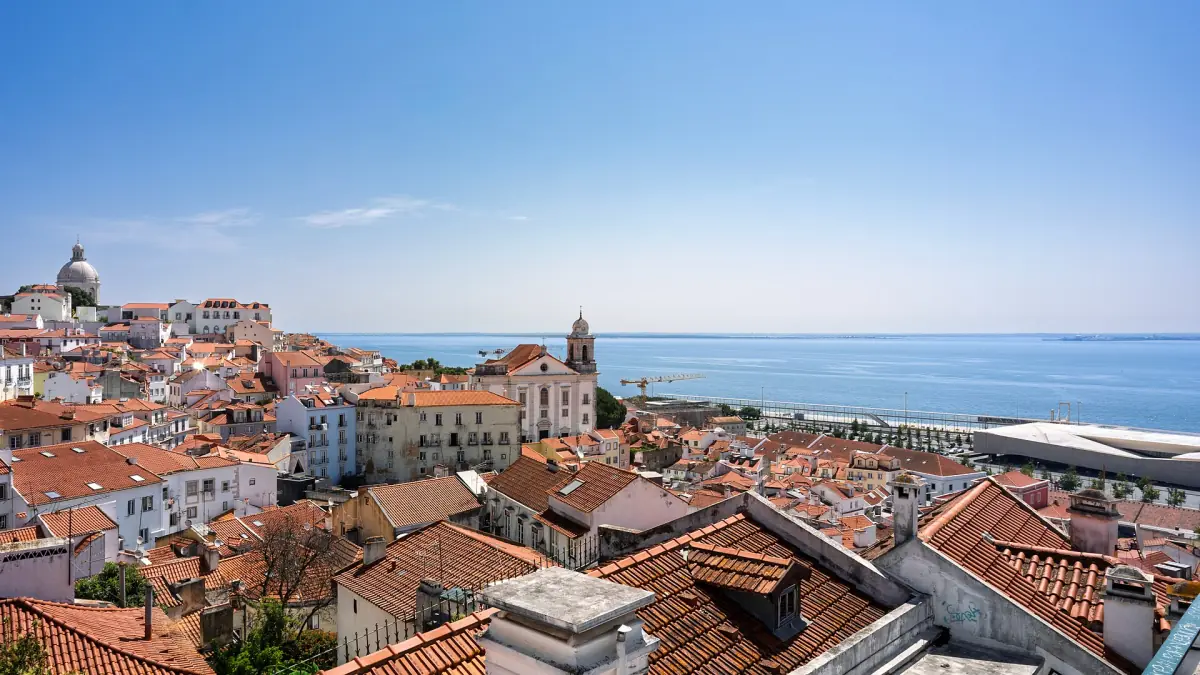 Alfama rooftops above the Tagus